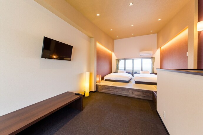 Imagen de la habitación del Hotel JAPANING KUJO. Foto 15