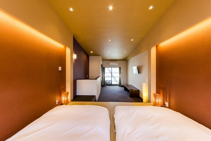 Imagen de la habitación del Hotel JAPANING KUJO. Foto 16