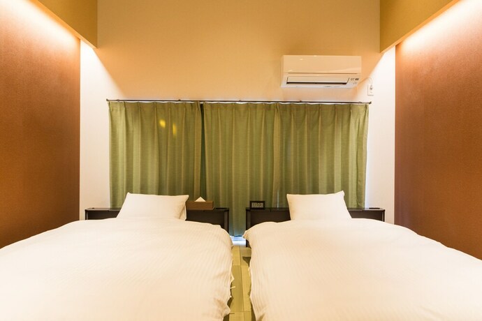 Imagen de la habitación del Hotel JAPANING KUJO. Foto 17