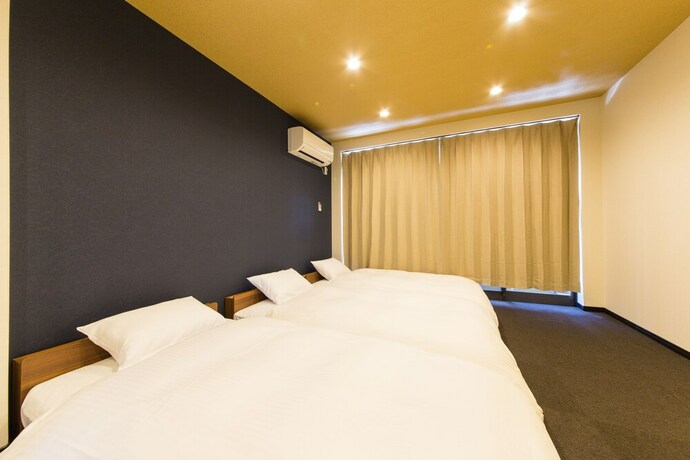Imagen de la habitación del Hotel JAPANING KUJO. Foto 19