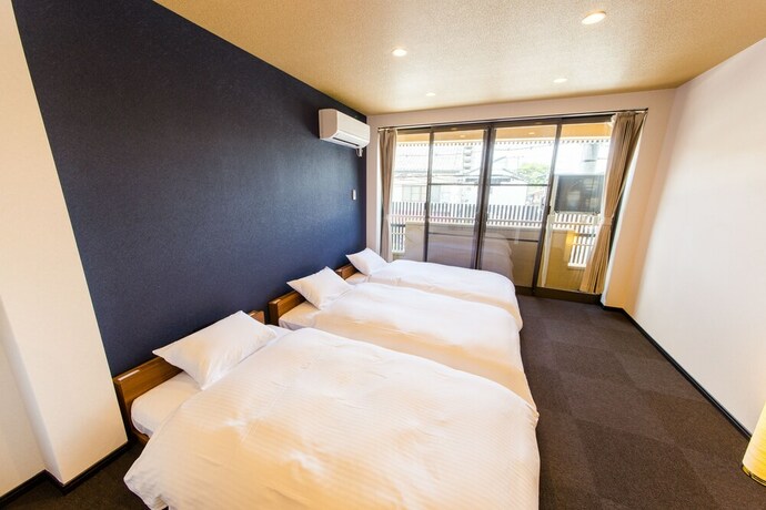 Imagen de la habitación del Hotel JAPANING KUJO. Foto 20
