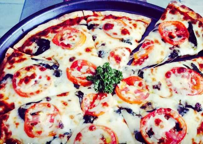 Imagen del bar/restaurante del Hotel JAPI Traveller\'s and Restaurant - Annex. Foto 3