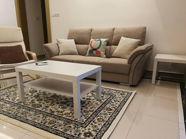 Imagen de la habitación del Hotel JB CITY CIQ Shopping Mall Apartment. Foto 16