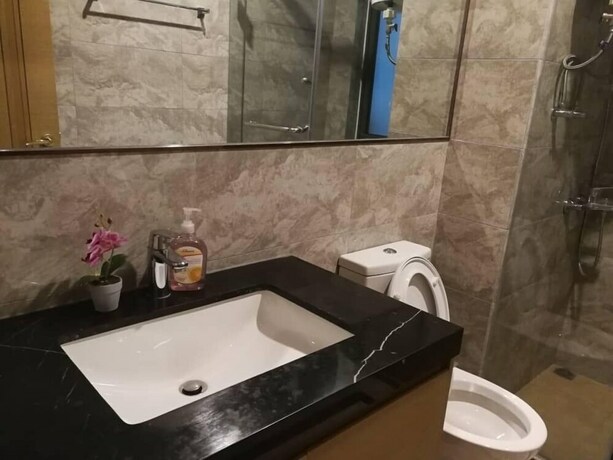 Imagen de la habitación del Hotel JB CITY CIQ Shopping Mall Apartment. Foto 17