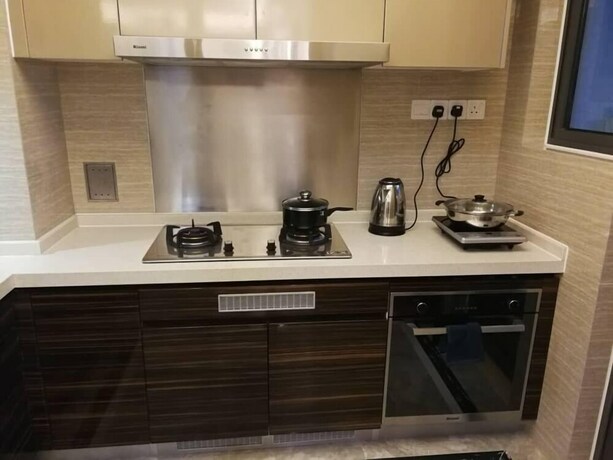 Imagen de la habitación del Hotel JB CITY CIQ Shopping Mall Apartment. Foto 27
