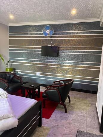 Imagen de la habitación del Hotel JB suites and lounge. Foto 20