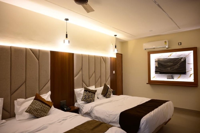 Imagen de la habitación del Hotel JBS Regency and Banquet. Foto 7