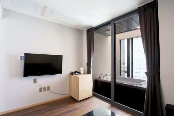 Imagen de la habitación del Hotel JEJU DSPHERE. Foto 11