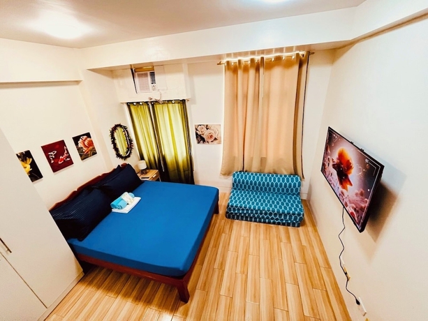 Imagen de la habitación del Hotel JFam Suites. Foto 3
