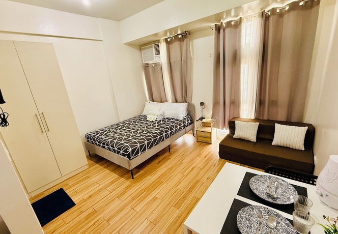 Imagen de la habitación del Hotel JFam Suites. Foto 4