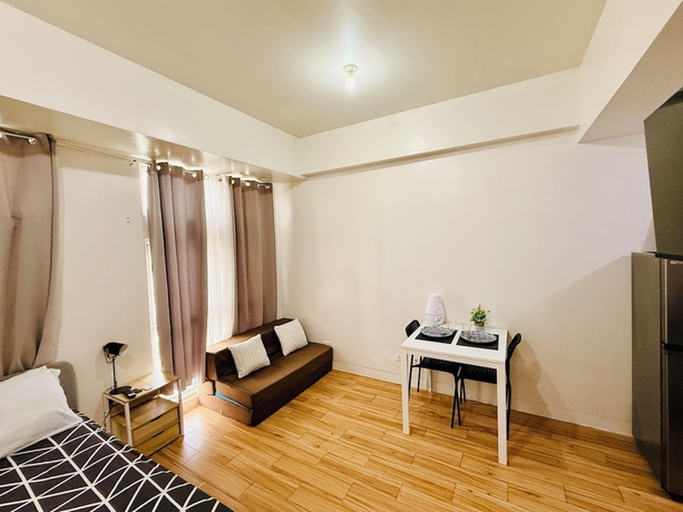 Imagen de la habitación del Hotel JFam Suites. Foto 5