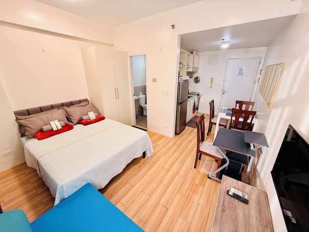 Imagen de la habitación del Hotel JFam Suites. Foto 6