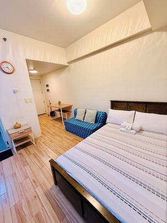 Imagen de la habitación del Hotel JFam Suites. Foto 8