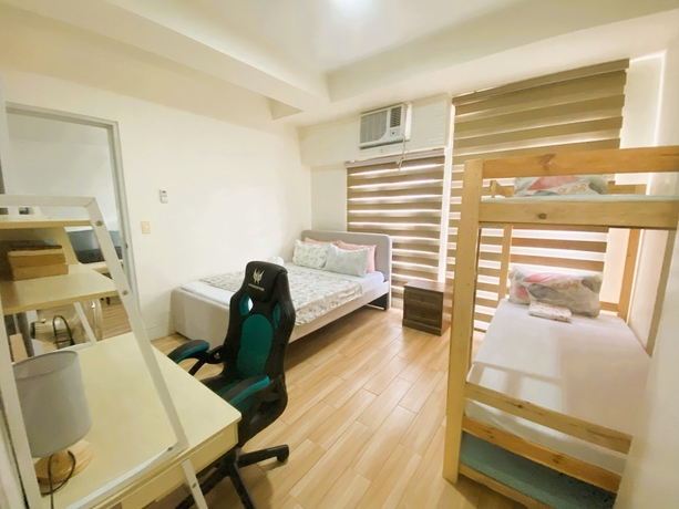 Imagen de la habitación del Hotel JFam Suites. Foto 10