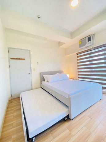 Imagen de la habitación del Hotel JFam Suites. Foto 11