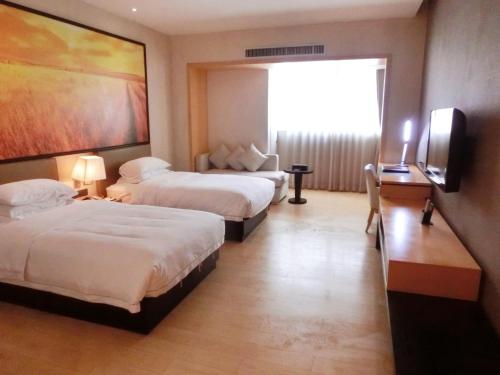 Imagen de la habitación del Hotel J-Hotel, tianhe. Foto 6