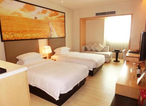 Imagen de la habitación del Hotel J-Hotel, tianhe. Foto 10