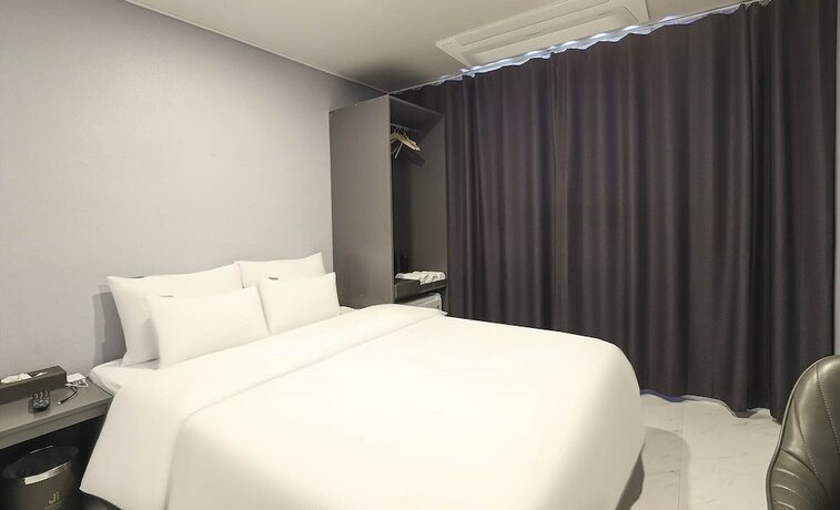 Imagen de la habitación del Hotel JI Boutique. Foto 16