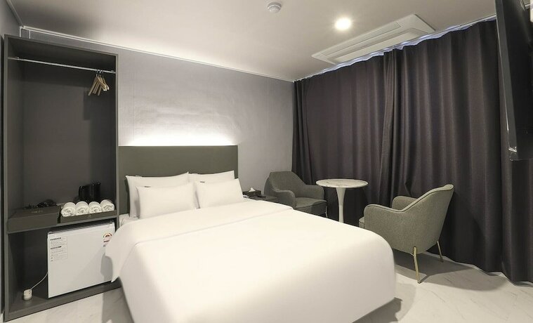 Imagen de la habitación del Hotel JI Boutique. Foto 17