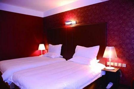 Imagen de la habitación del Hotel JI Hotel Chaoyangmen Beijing. Foto 3