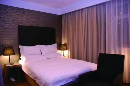 Imagen de la habitación del Hotel JI Hotel Chaoyangmen Beijing. Foto 4