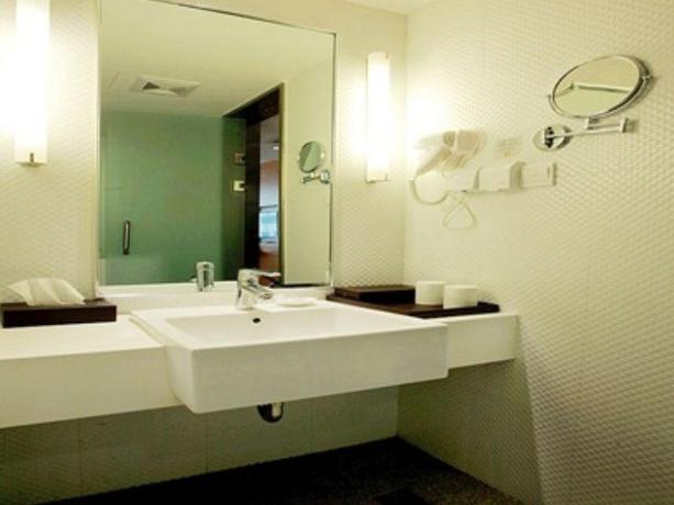 Imagen de la habitación del Hotel JI Hotel Dalian Renmin Road. Foto 4