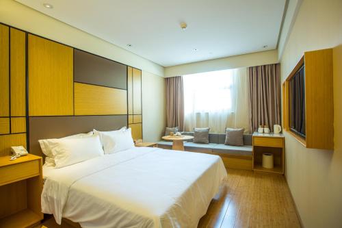 Imagen de la habitación del Hotel JI Hotel Shanghai Changshou Road. Foto 3