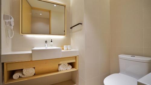 Imagen de la habitación del Hotel JI Hotel Shanghai Hongqiao Hechuan Road. Foto 5