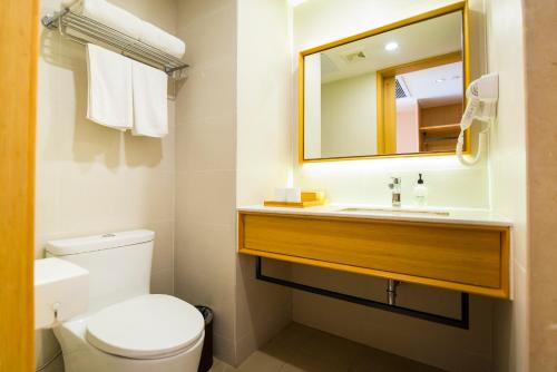 Imagen de la habitación del Hotel JI Hotel Shanghai Xujiahui Zhaojiabang Road. Foto 8