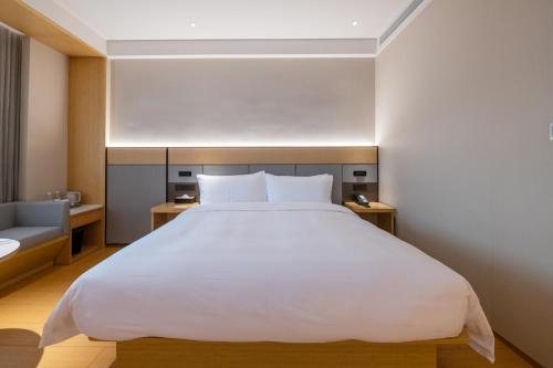 Imagen de la habitación del Hotel JI Shanghai Pudong Airport East Station-全季上海浦东机场东站酒店-酒店提供浦东机场免费穿梭巴士. Foto 19