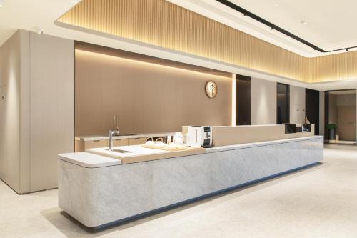 Imagen general del Hotel JI Wuhan Baishazhou Hongshan Vanke Plaza Branch. Foto 5