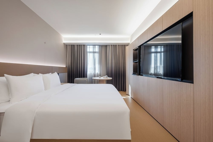 Imagen de la habitación del Hotel JI - Zhangjiajie Tianmen Mountain. Foto 1