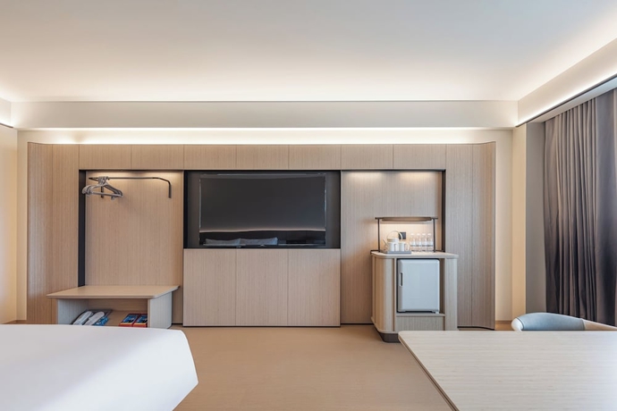 Imagen de la habitación del Hotel JI - Zhangjiajie Tianmen Mountain. Foto 12