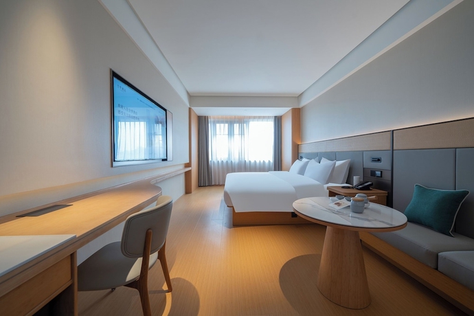 Imagen de la habitación del Hotel JI Zhangzhou Yuehui Plaza. Foto 5