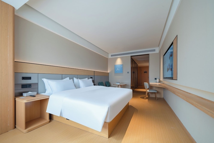 Imagen de la habitación del Hotel JI Zhangzhou Yuehui Plaza. Foto 6