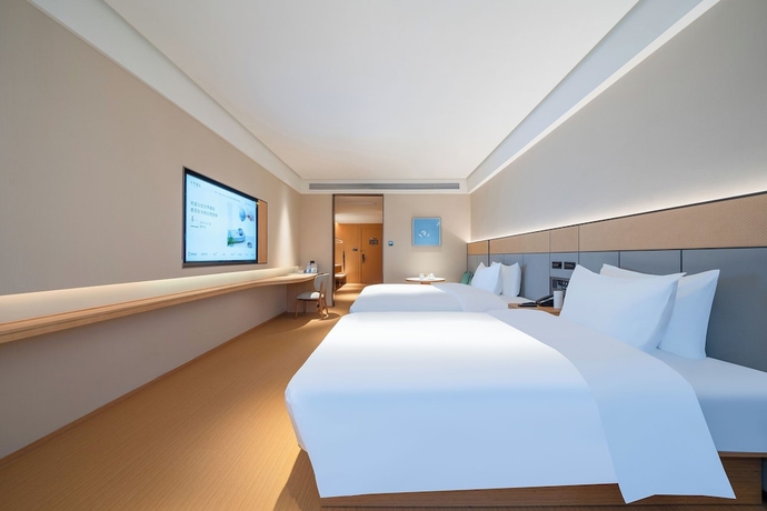 Imagen de la habitación del Hotel JI Zhangzhou Yuehui Plaza. Foto 7