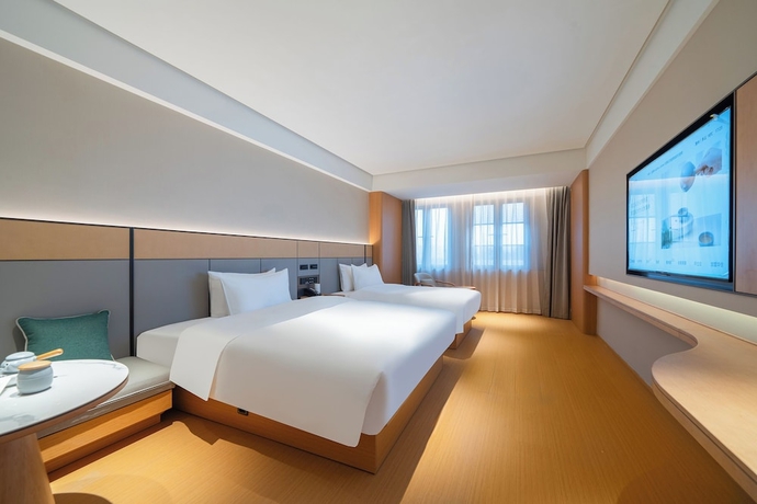 Imagen de la habitación del Hotel JI Zhangzhou Yuehui Plaza. Foto 8