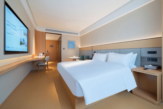 Imagen de la habitación del Hotel JI Zhangzhou Yuehui Plaza. Foto 9