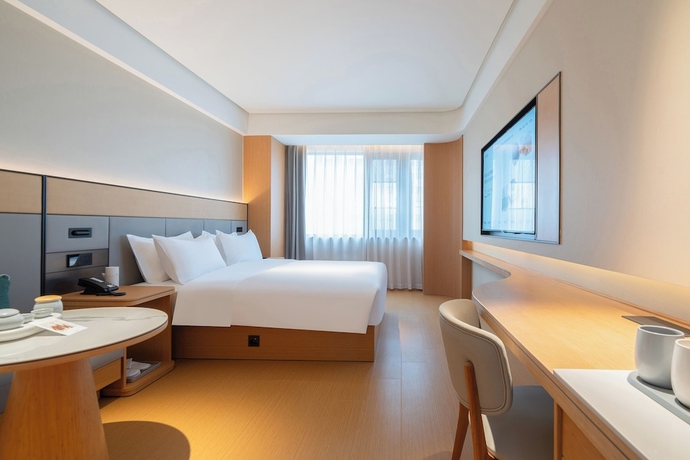 Imagen de la habitación del Hotel JI Zhangzhou Yuehui Plaza. Foto 10