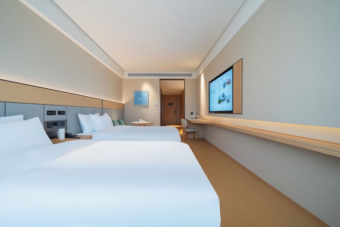 Imagen de la habitación del Hotel JI Zhangzhou Yuehui Plaza. Foto 11