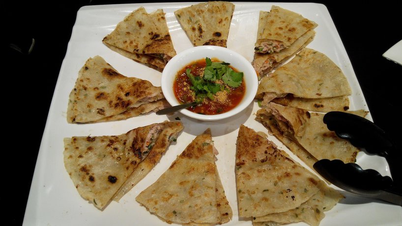 Imagen del bar/restaurante del Hotel JIJIQINHAI HOTEL. Foto 3