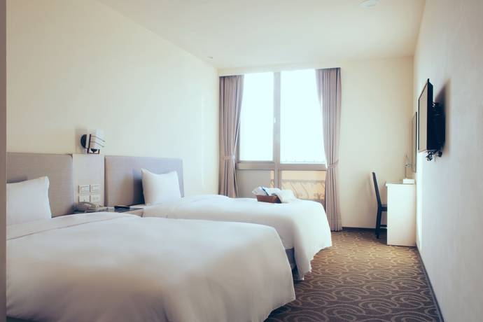 Imagen de la habitación del Hotel JIJIQINHAI HOTEL. Foto 15