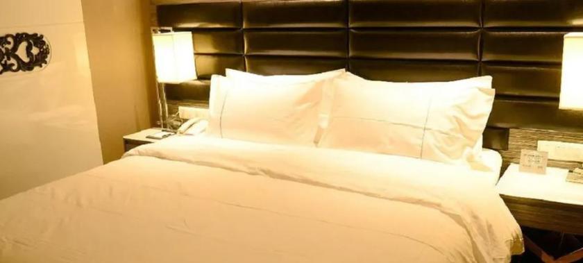 Imagen de la habitación del Hotel JINDI MINGTING HOTEL. Foto 3