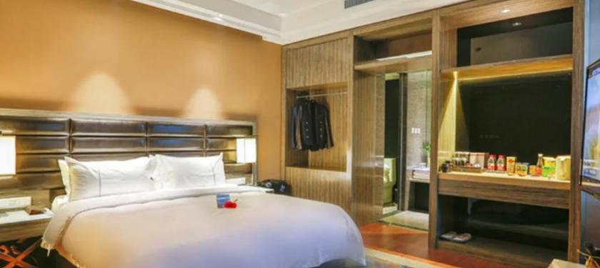 Imagen de la habitación del Hotel JINDI MINGTING HOTEL. Foto 11