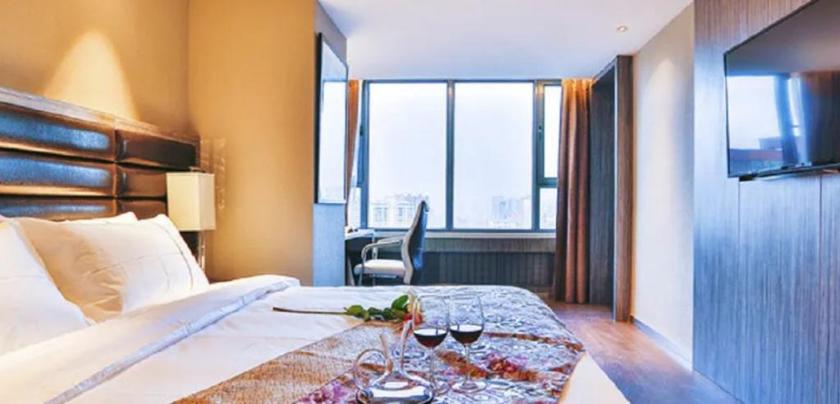 Imagen de la habitación del Hotel JINDI MINGTING HOTEL. Foto 17