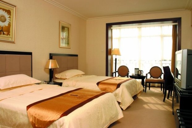 Imagen de la habitación del Hotel JINGDU BUSINESS. Foto 3