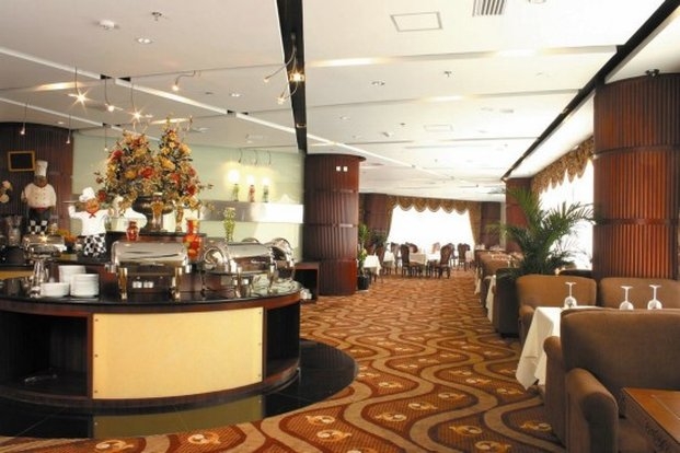 Imagen del bar/restaurante del Hotel JINGDU BUSINESS. Foto 2