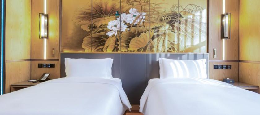 Imagen de la habitación del Hotel JINGLI HOTEL (BEIJING CAPITAL AIRPORT). Foto 6