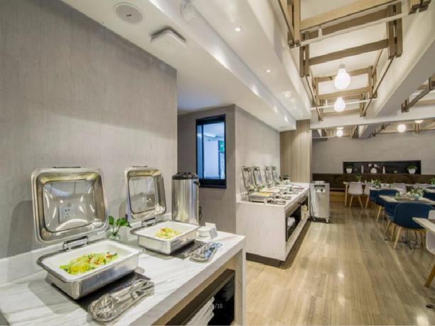 Imagen del bar/restaurante del Hotel JINJIANG METROPOLO HOTEL HANGZHOU HUANGLONG WENSAN. Foto 4