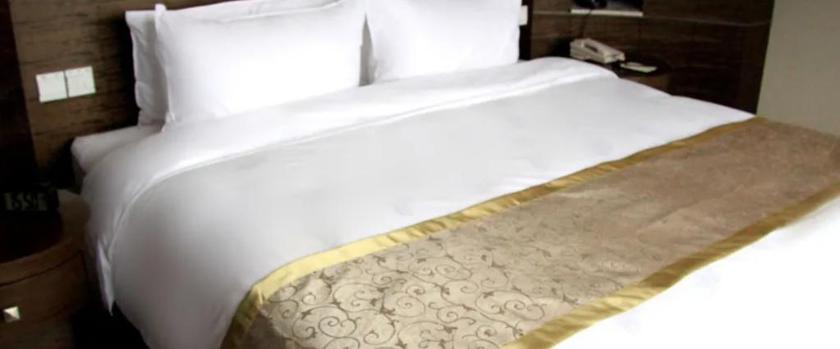 Imagen de la habitación del Hotel JINLING INTERNATIONAL HOTEL. Foto 5